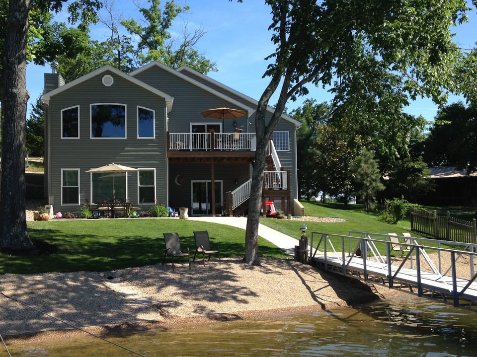 Easy no steps access to beach and swim platform/dock.