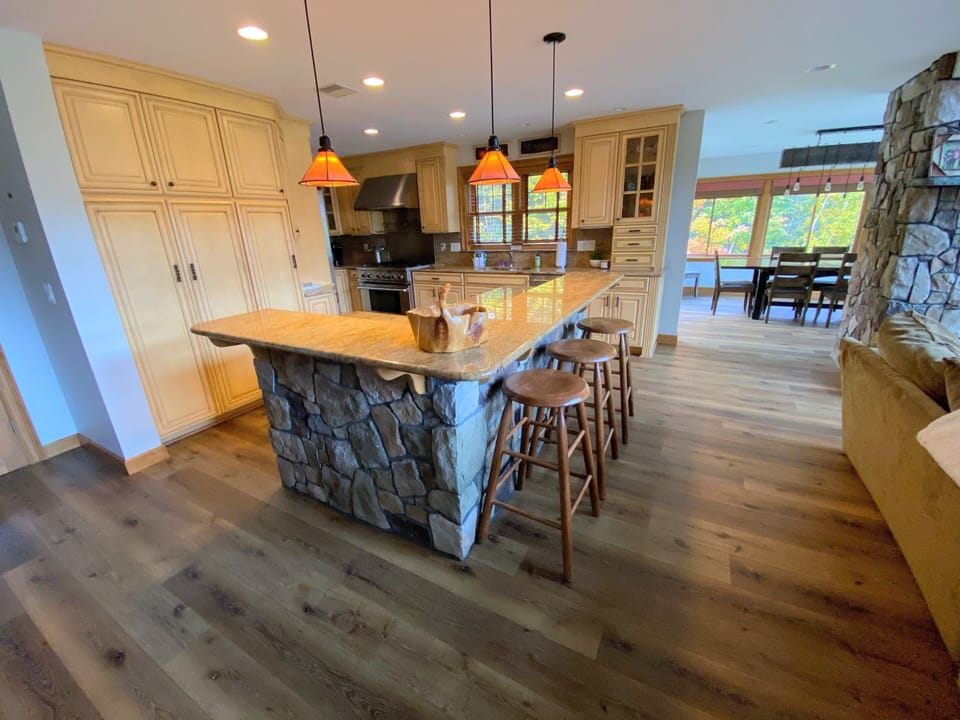 Heated floors on the main level add an extra touch of comfort