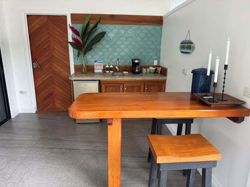 A private coffee bar and kitchenette on the lower garden level.