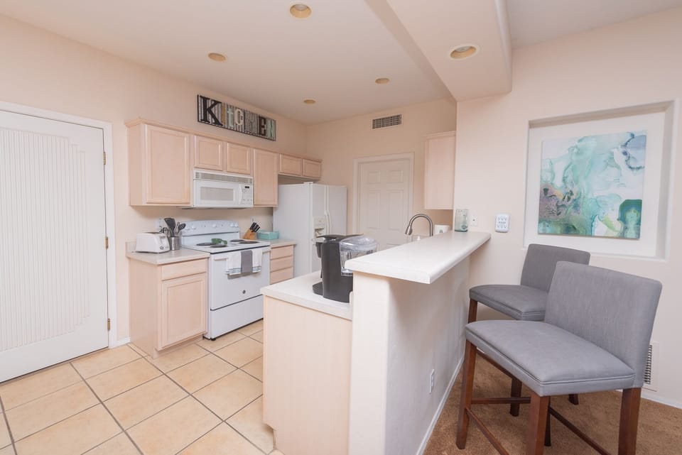 Bright kitchen - everything you need to whip up a meal or shake up a cocktail! 