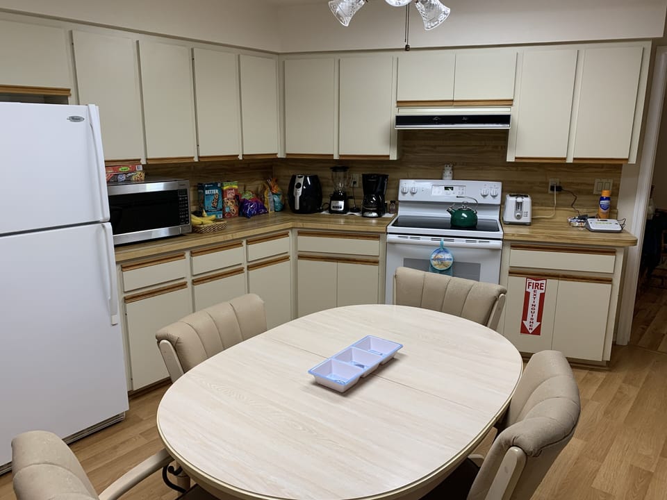Kitchen with eat in table.