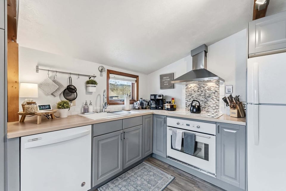 Updated Kitchen — Fully renovated and thoughtfully equipped with modern appliances, cookware, and everything needed to prepare meals at home.