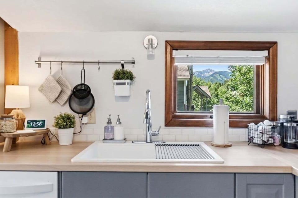 Fresh & Bright — Clean, modern, and thoughtfully designed, the kitchen is a welcoming space to cook, gather, or simply enjoy your morning coffee.