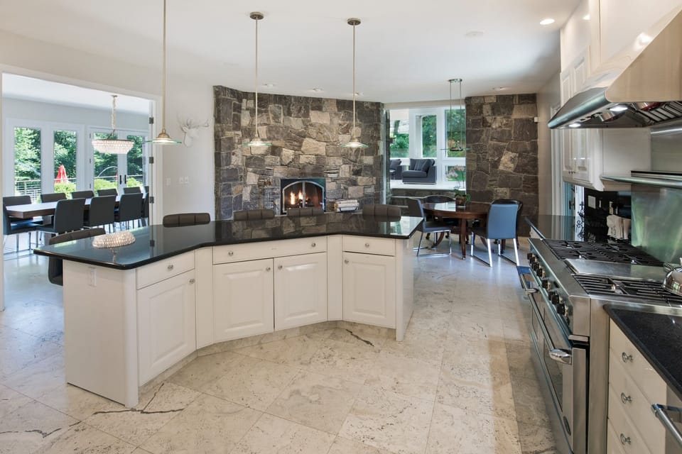 Designer Chef's Dream Kitchen with Island & fireplace. 