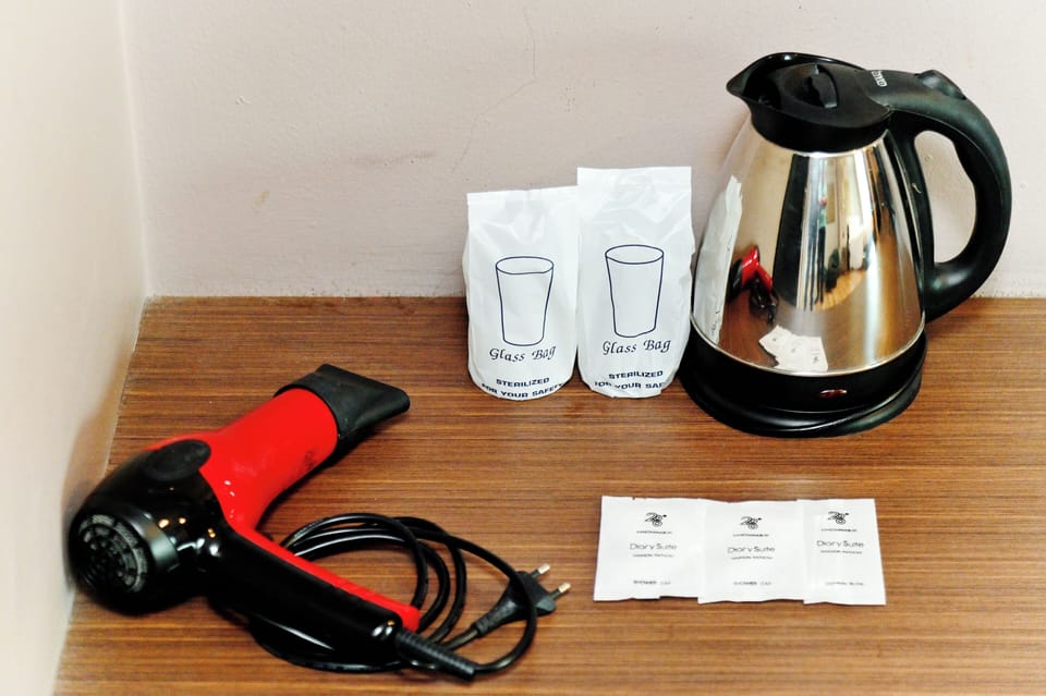 Deluxe Twin Room, Non Smoking | Minibar, in-room safe, desk, blackout drapes