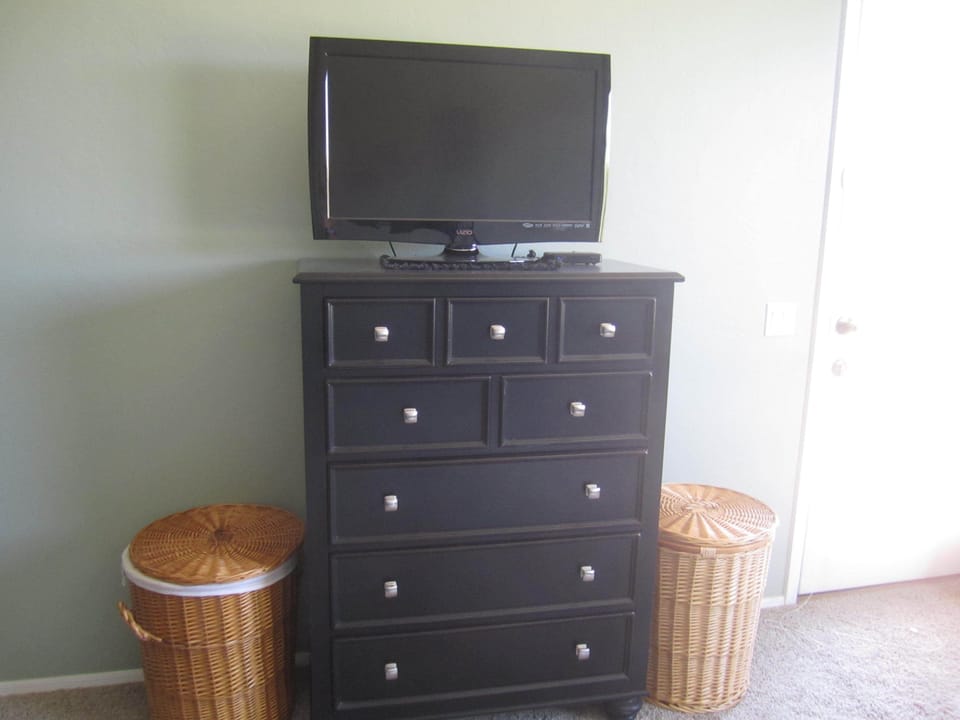 Master Bedroom chest of drawers and TV.