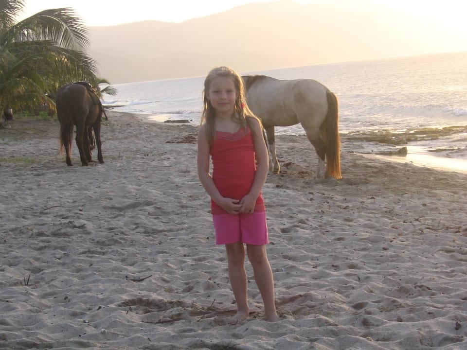 My granddaughter on the beach