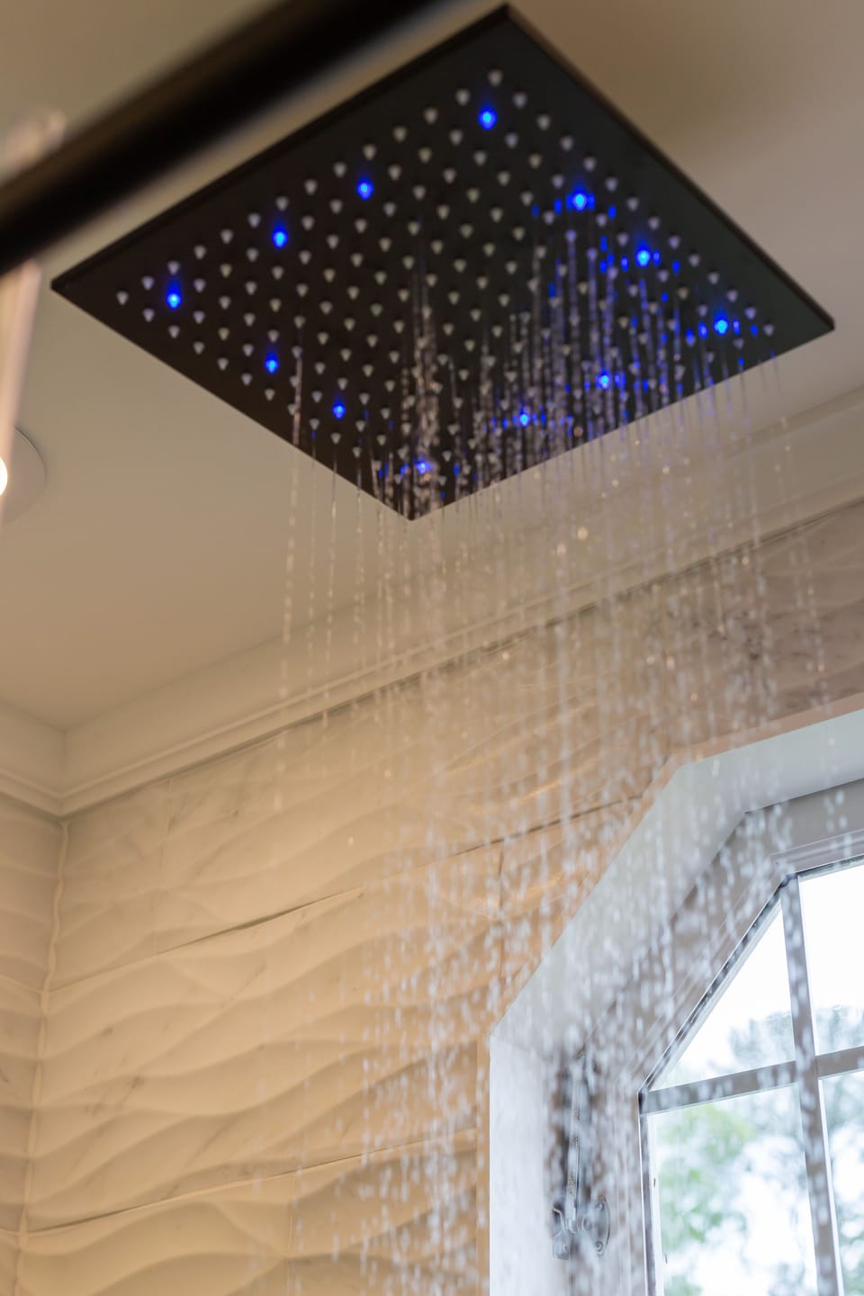 Led Rainfall shower head changes color based on temperature...Cool!!