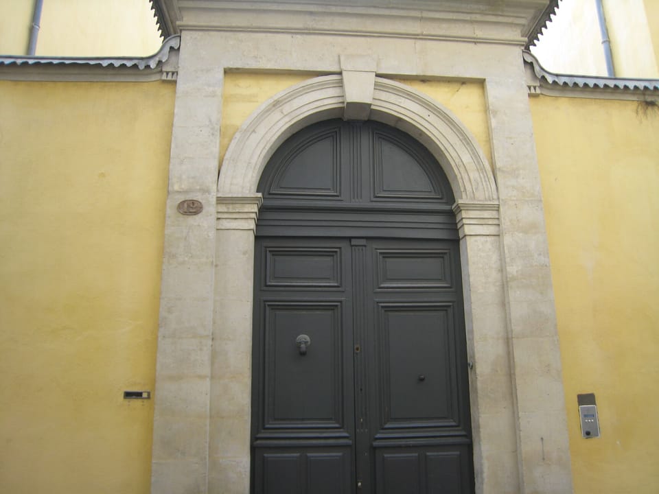 Front door of "Hotel Fabregat"or an old family private Mansión in English