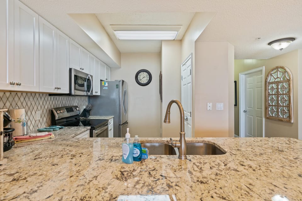 Kitchen view with a separate pantry.