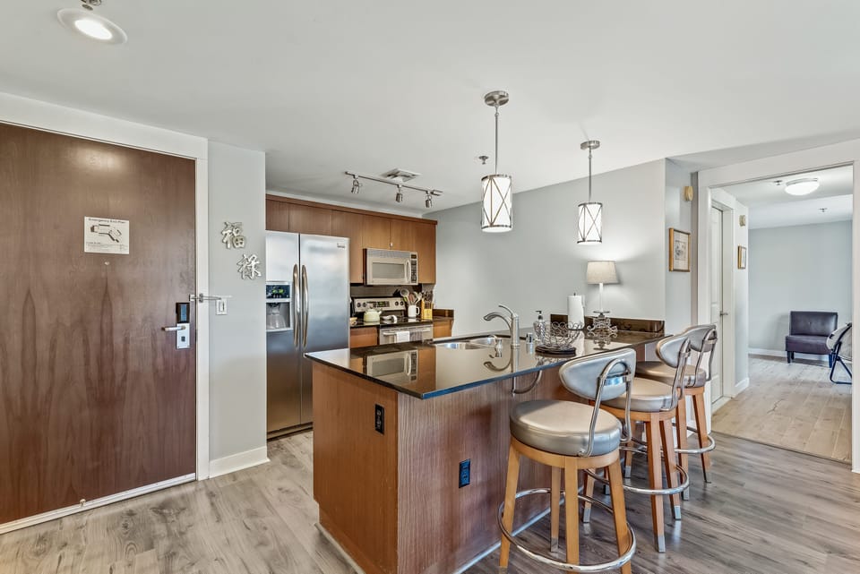 Wood look flooring in kitchen and living space.