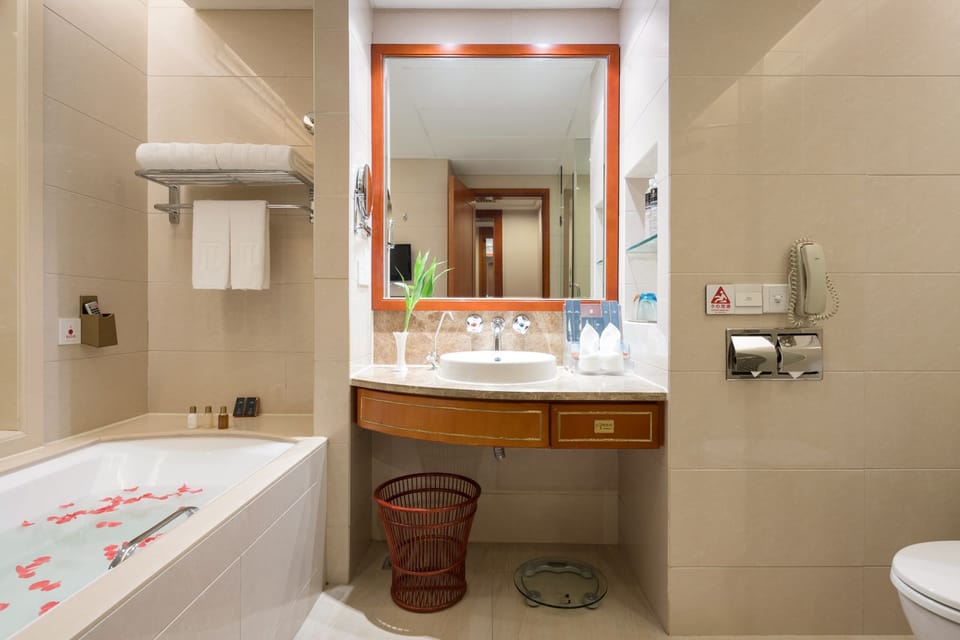 Separate tub and shower, deep soaking tub, rainfall showerhead