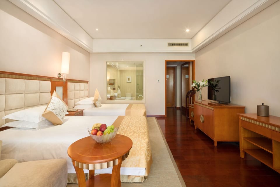 Premium bedding, down comforters, memory foam beds, minibar
