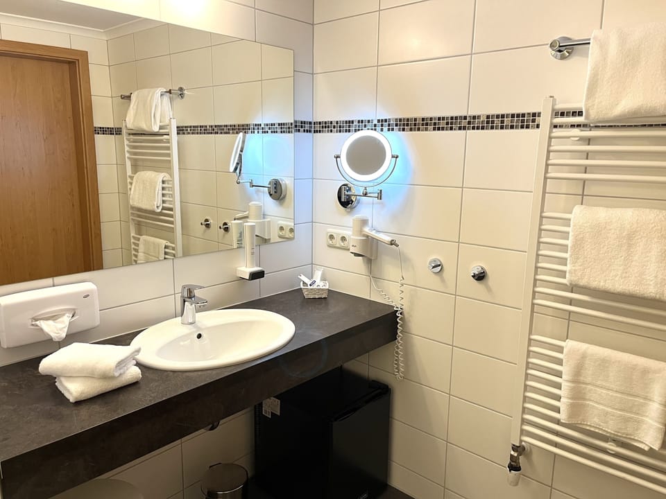 Superior Family Room | Bathroom | Shower, rainfall showerhead, free toiletries, hair dryer