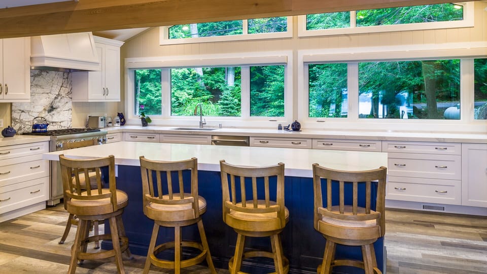 Kitchen island seats five.