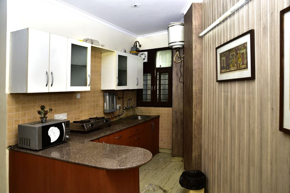 Woodpecker Apartment 2 Bedroom Service Apartment | Private kitchen | Fridge, microwave, oven, coffee/tea maker