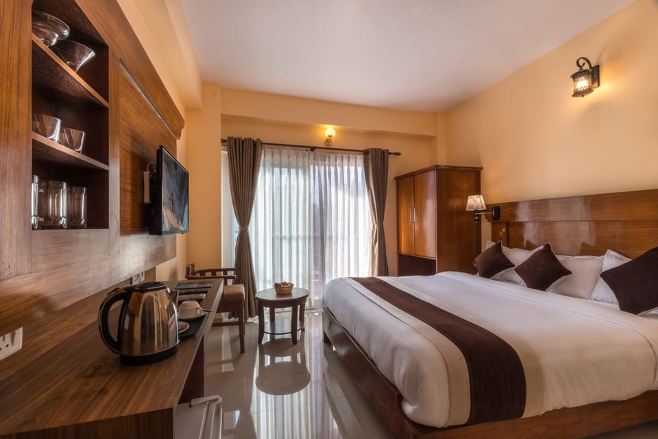 Deluxe Double Room, 1 King Bed, Mountain View | Premium bedding, down comforters, laptop workspace, blackout drapes