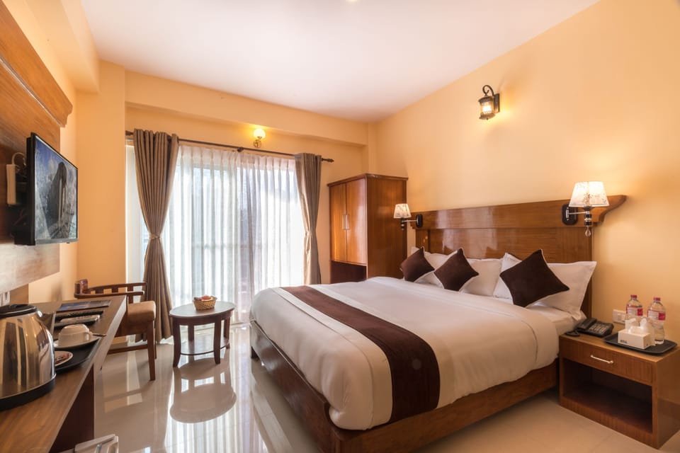 Deluxe Double Room, 1 King Bed, Mountain View | Premium bedding, down comforters, laptop workspace, blackout drapes