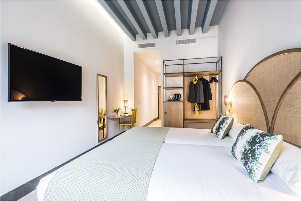 Deluxe Double or Twin Room, City View | Minibar, in-room safe, desk, blackout drapes