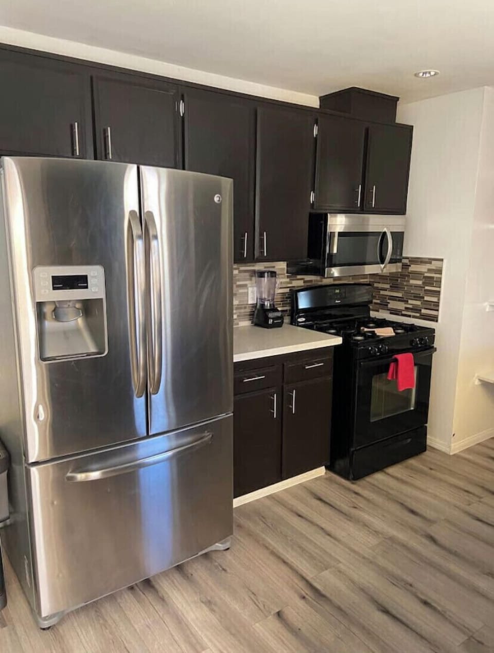Full kitchen with keurig, regular coffee maker, fridge and freezer, oven, etc.