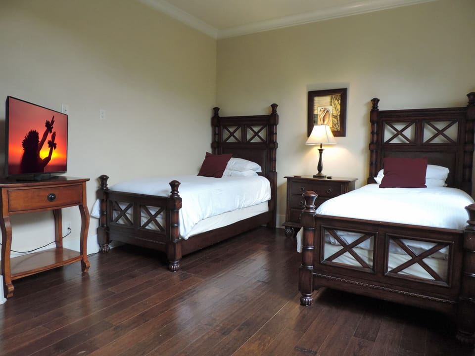 Suite 3 can be two twin beds or king bed. Villa has Central Vacuum, Central Air.
