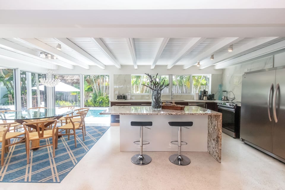 Kitchen / Dining / Island and view to pool