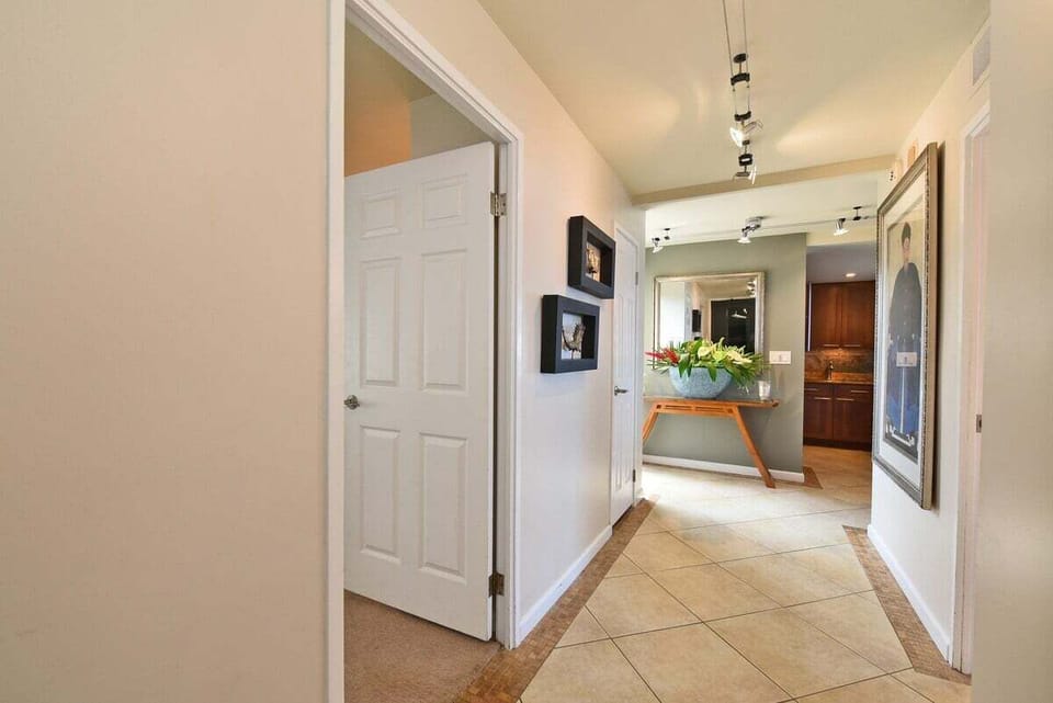 A thoughtfully decorated hallway that enhances the flow and beauty of the home