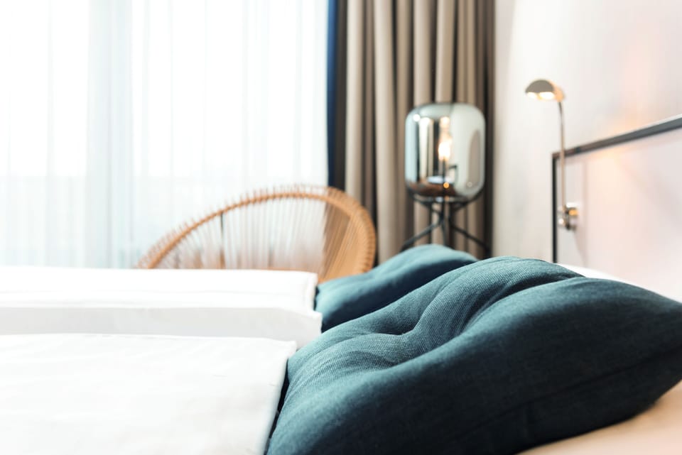Hypo-allergenic bedding, in-room safe, desk, laptop workspace