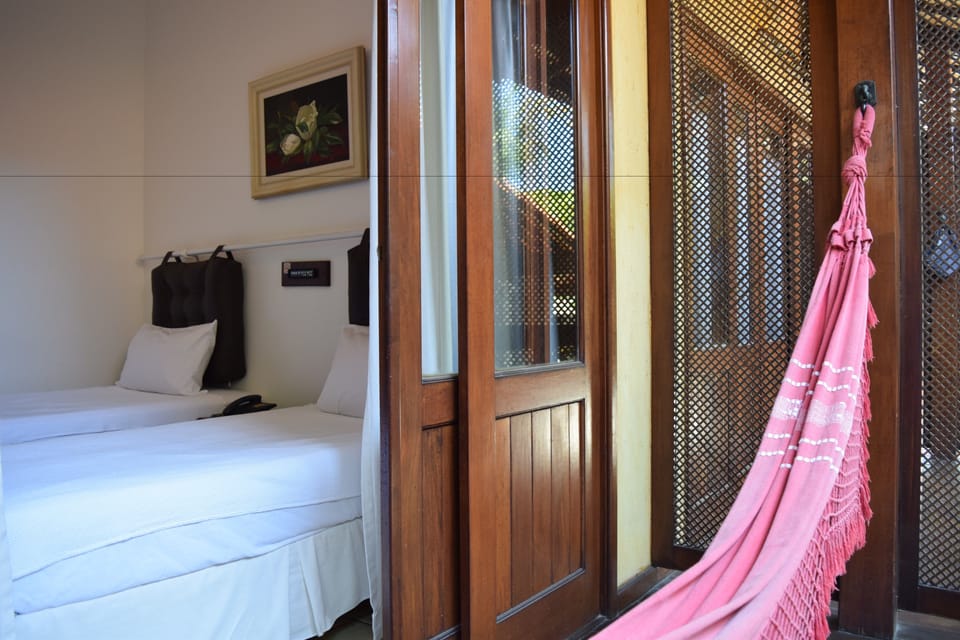 Standard Twin Room | Minibar, in-room safe, laptop workspace, soundproofing