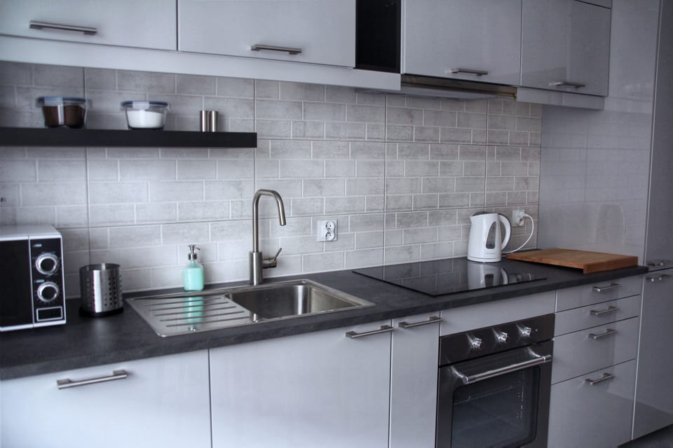 Comfort Apartment | Private kitchen | Fridge, microwave, stovetop, coffee/tea maker
