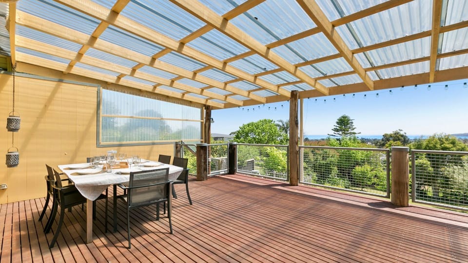 Large decking with outdoor dining and BBQ