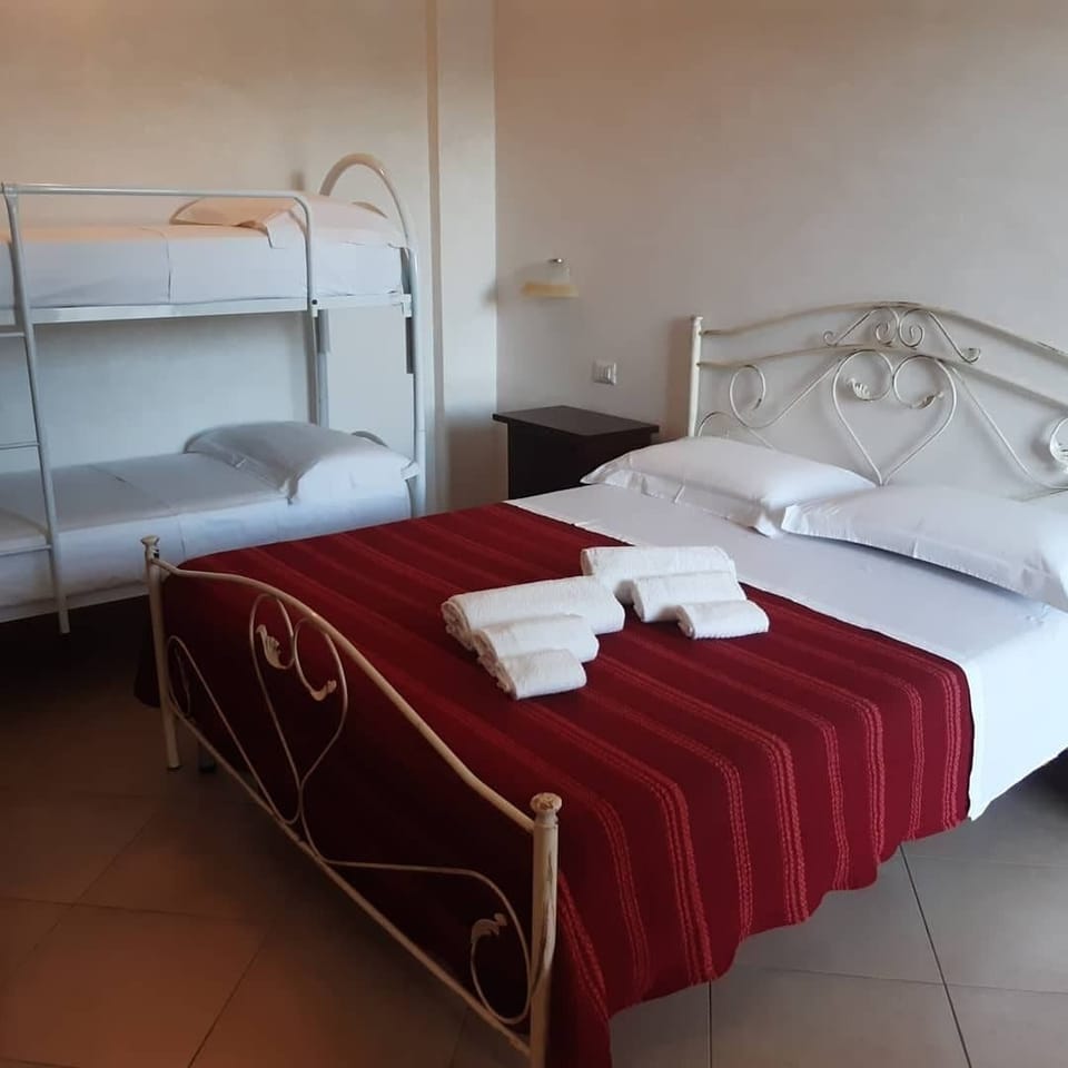 Quadruple Room, Garden View | Bed sheets