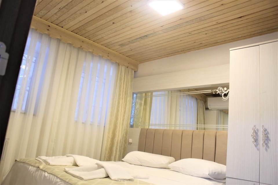 Economy Double Room | Premium bedding, minibar, in-room safe, blackout drapes