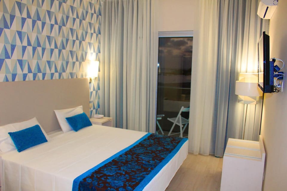 Minibar, desk, blackout drapes, bed sheets