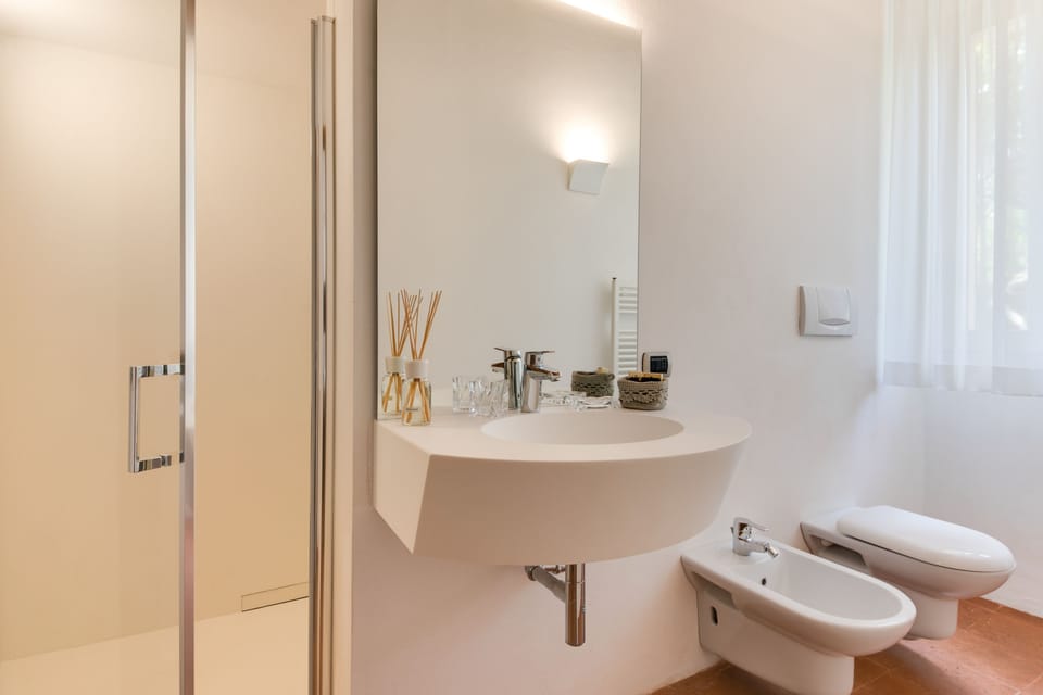 Double Room, Private Bathroom, Ground Floor (Corbezzolo) | Bathroom | Free toiletries, hair dryer, bathrobes, slippers