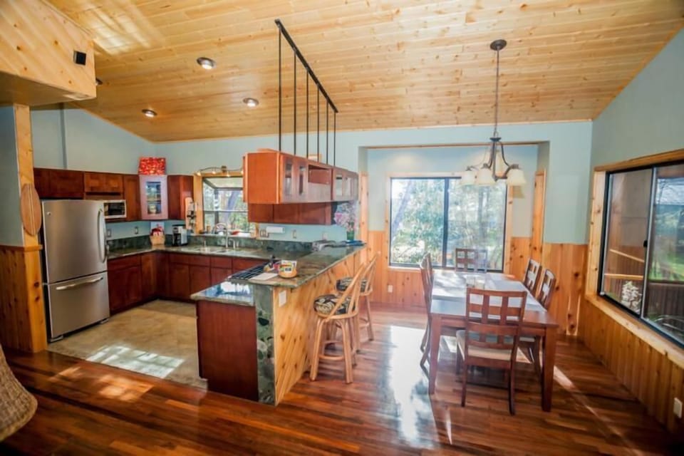 Bar counter separates the kitchen & dining room for a great flow in interaction.