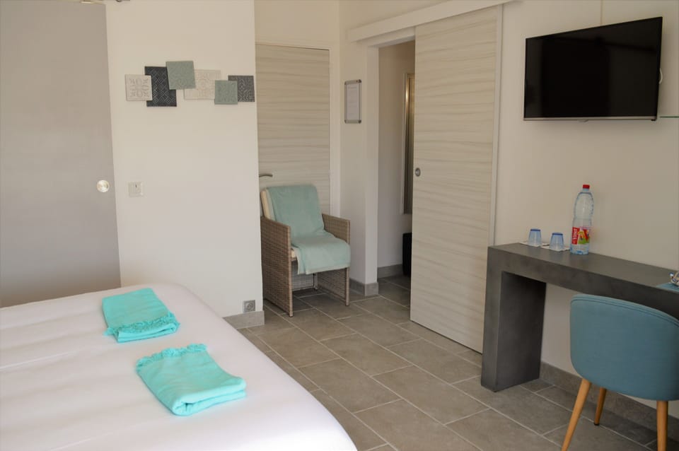 Deluxe Double Room, 1 Queen Bed, Terrace, Partial Sea View | Egyptian cotton sheets, premium bedding, Select Comfort beds, minibar