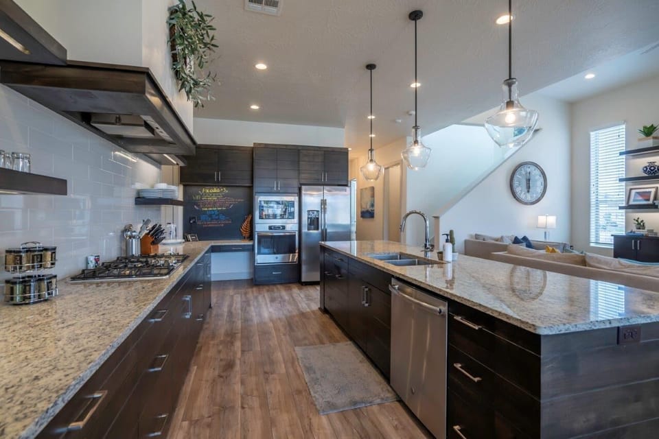 Kitchen is stocked with utensils and appliances for cooking