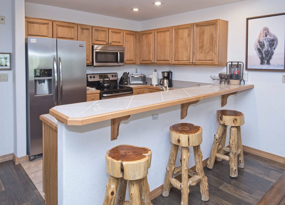 Condo, 2 Bedrooms | Private kitchen | Fridge, microwave, oven, dishwasher