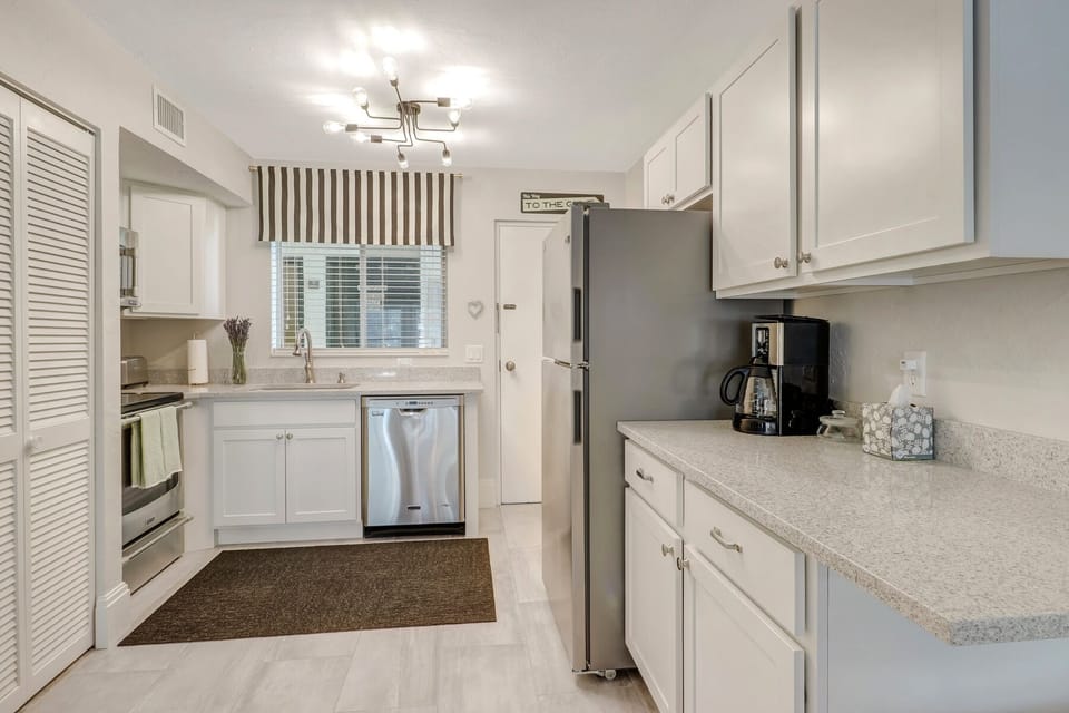 Fully equipped kitchen with stainless steel appliances