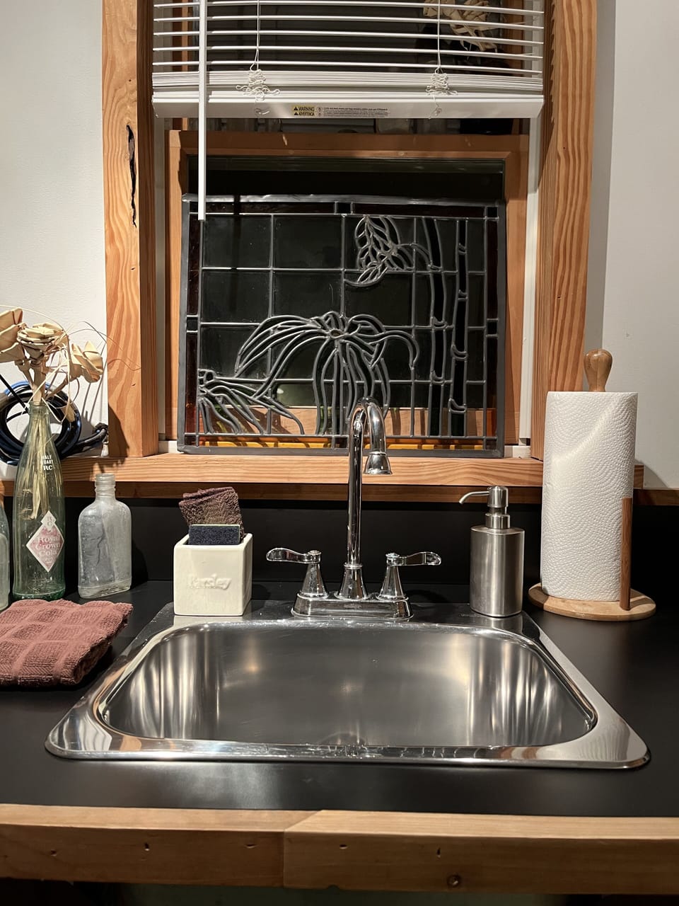Kitchen Sink with Stained Glass Window and Palmetto Flowers.
