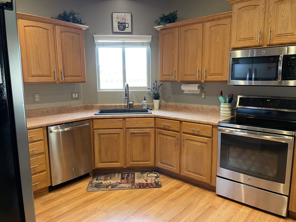 Large open kitchen with stainless appliances (fully stocked)
