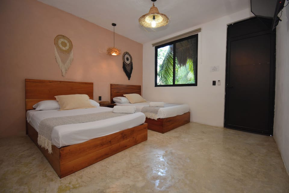 Basic Quadruple Room, Garden View | Soundproofing, free WiFi, bed sheets