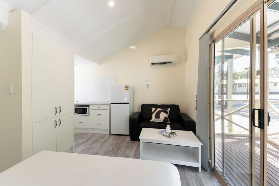 Cabin (Sleeps 2) | Living area | Flat-screen TV