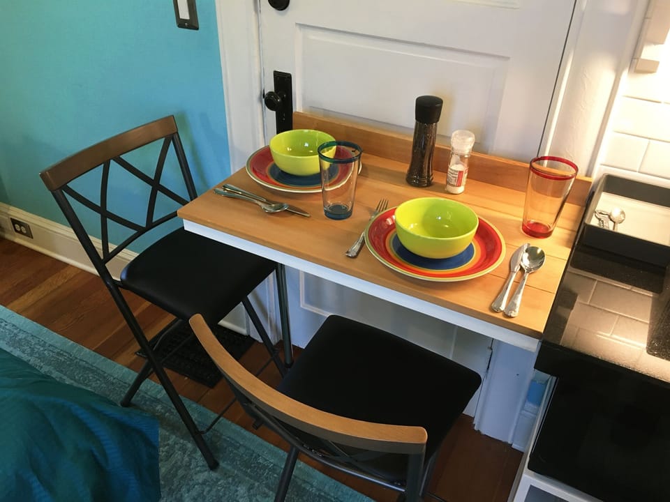 Swing-up counter and stools for your light meal or snack