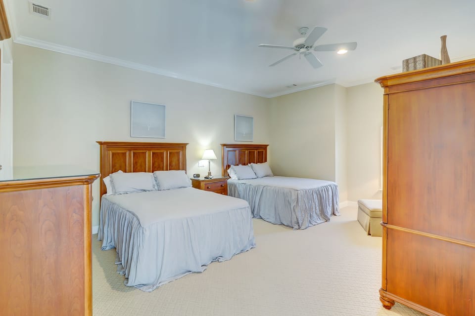 Upper level dual queen bedroom.