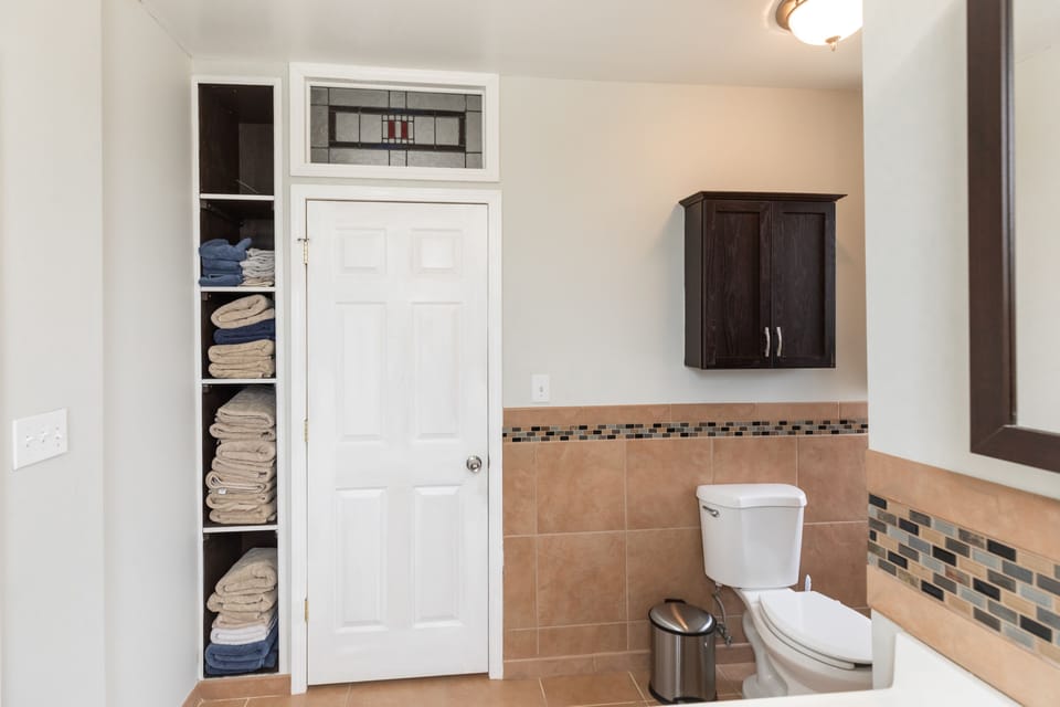 Second floor full bath with plenty of towels