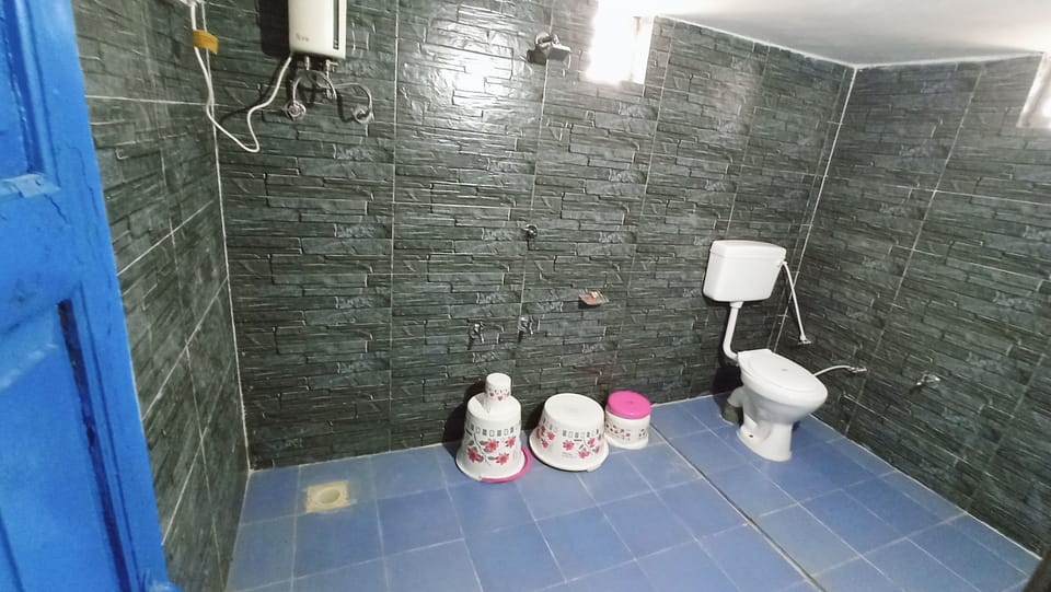 Separate tub and shower, free toiletries, slippers, towels