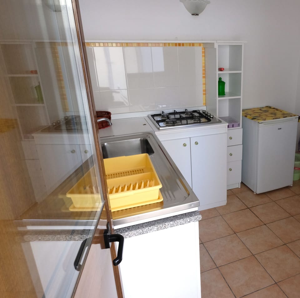 Family Room, 2 Bedrooms, Kitchenette | Private kitchen | Full-size fridge, freezer
