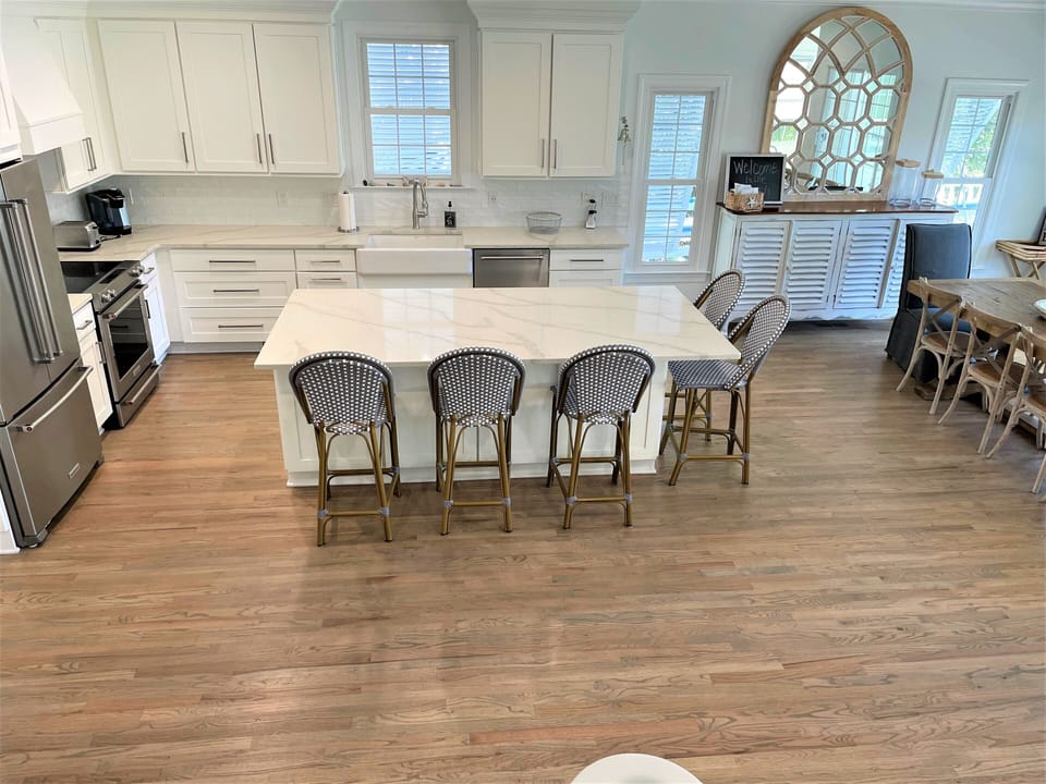 Kitchen view from stairs to upstairs